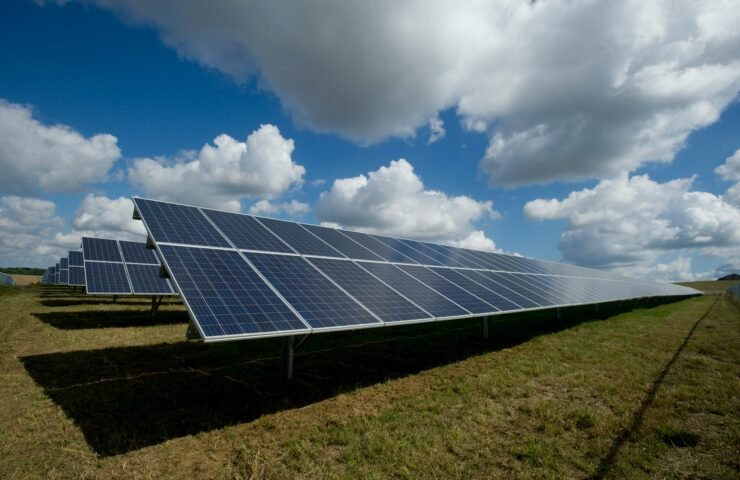 solar panels on green field